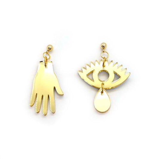 Mismatched Gold Hand Eye drops